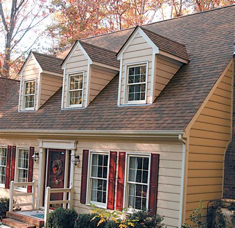 images of houses with metal roofs brown house|reddish brown roof house colors.